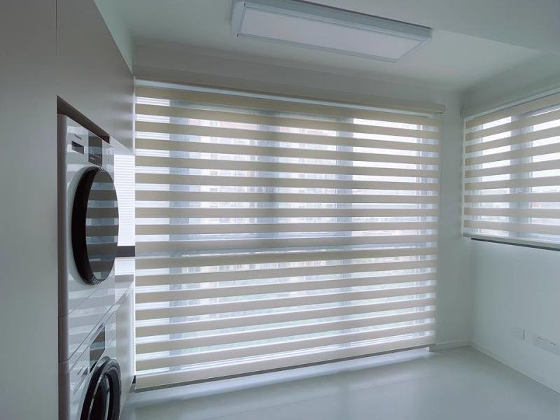 Residential window blinds installation -- roller shades in living room