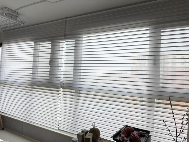 Commercial building window blinds -- large format cellular shades installation